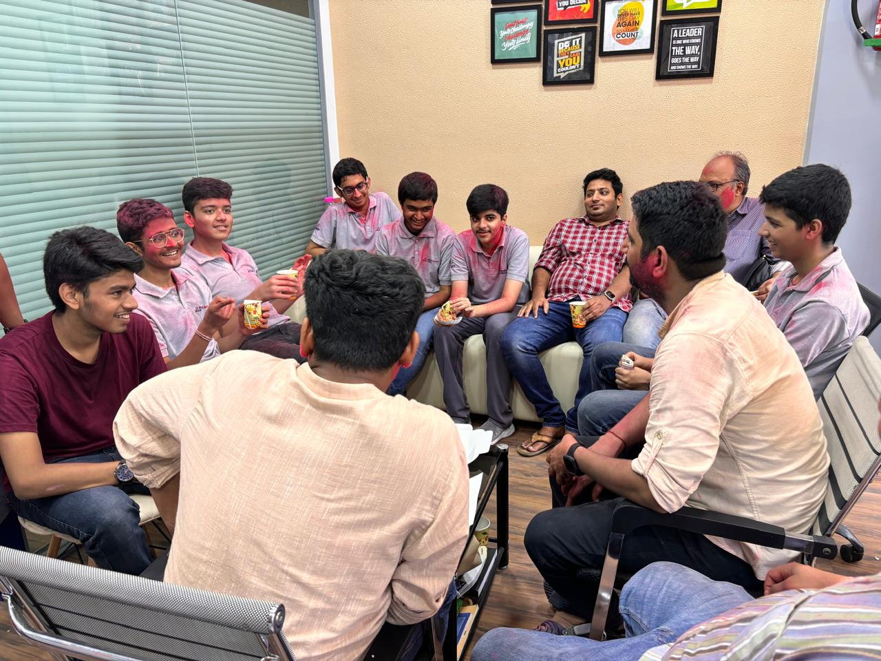 KENC family celebrating Holi together